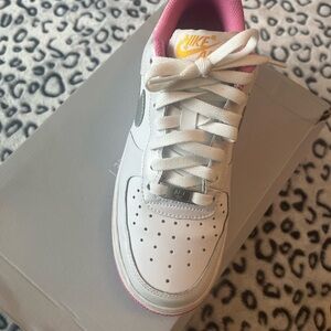 Nike Kids White Sneakers with Pink Highlights